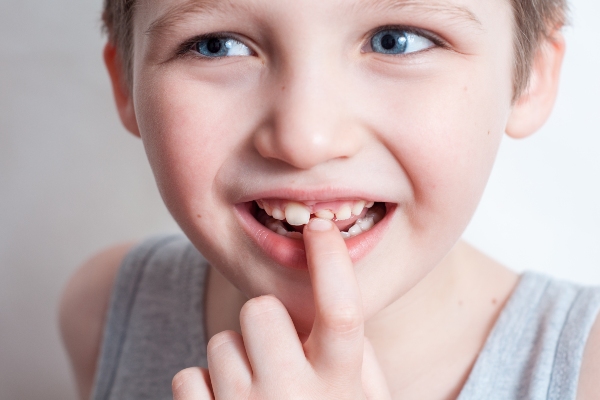 Tips From A Dental Practice: What To Do When A Child Has A Loose Tooth